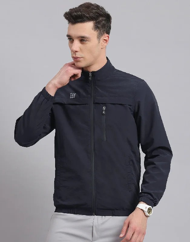 Men's pre-washed rain jacket-Men Navy Blue Solid Stand Collar Full Sleeve Jacket